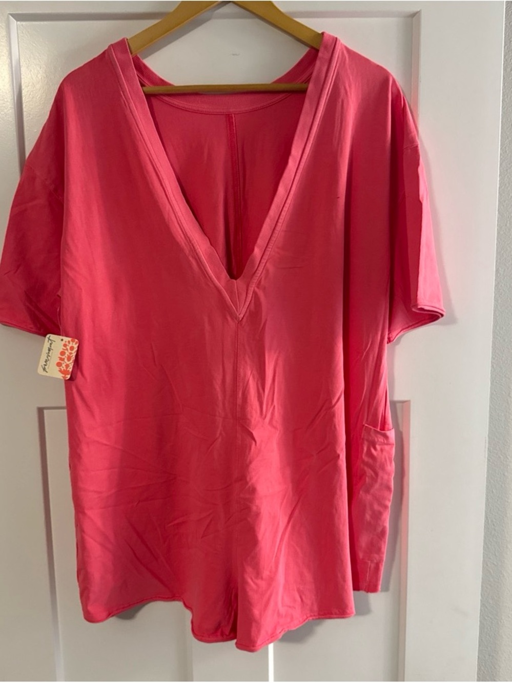 Free People Women's V-Neck Short Sleeve Romper with pockets.